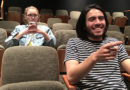 Texter Distracted by Man Watching Movie